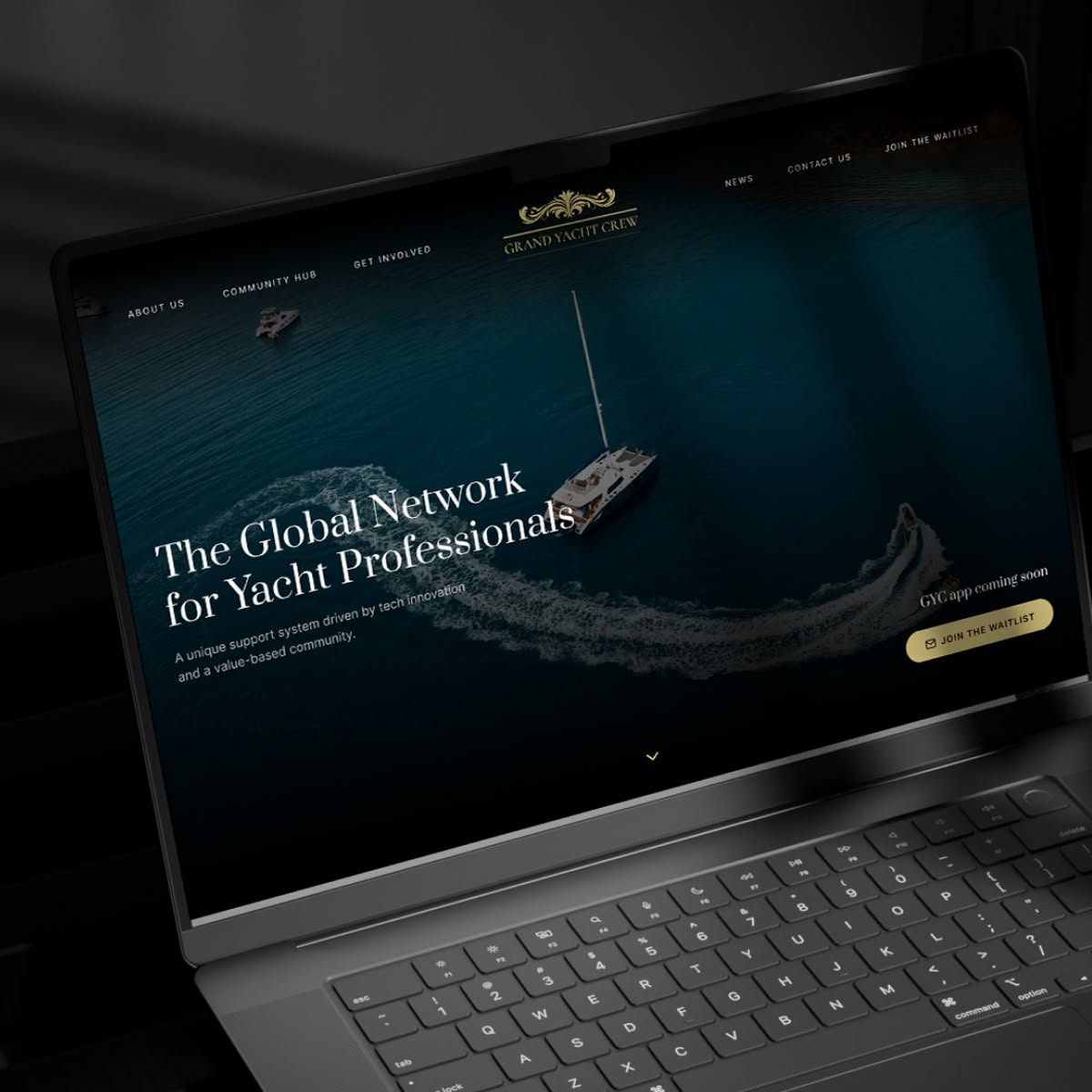 Grand Yacht Crew website on a laptop